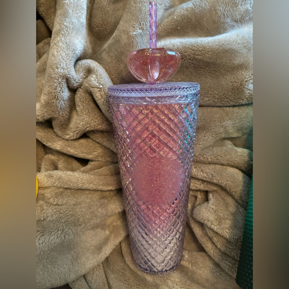 Pink Starbucks cup with jewel on top. Valentines 2022 overseas cup.